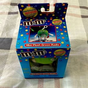 Vintage new in box M&M’s green personal FM radio with headset.
